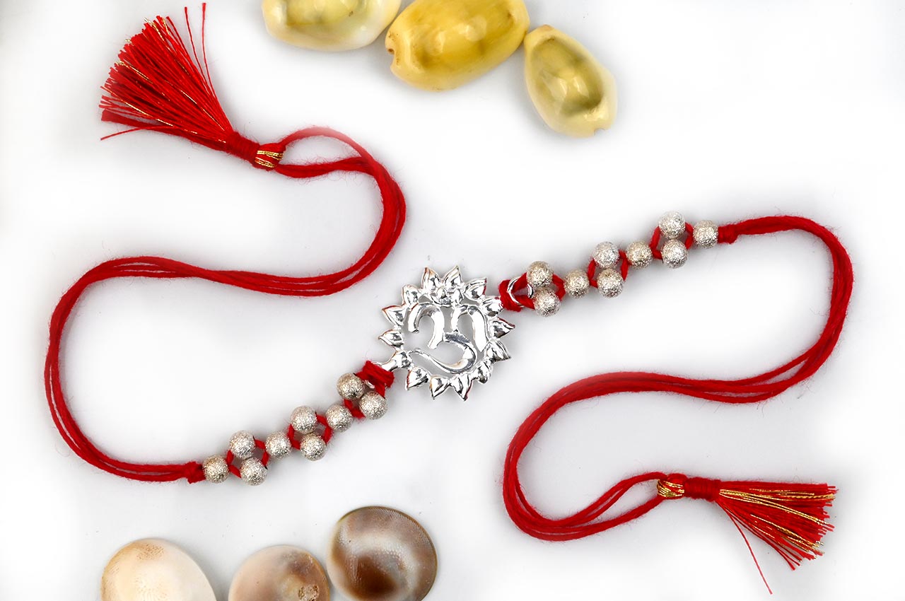 OM Design Rakhi in Pure Silver with thread