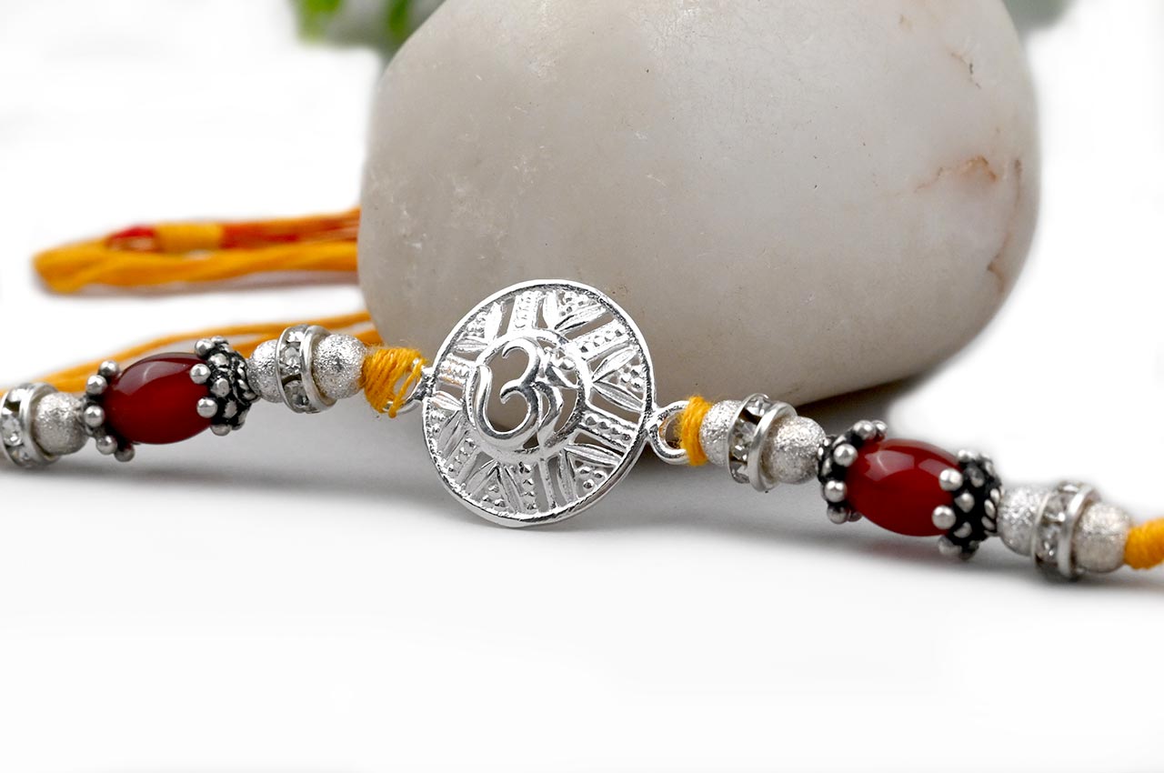 OM Design Rakhi in Pure Silver with thread - III