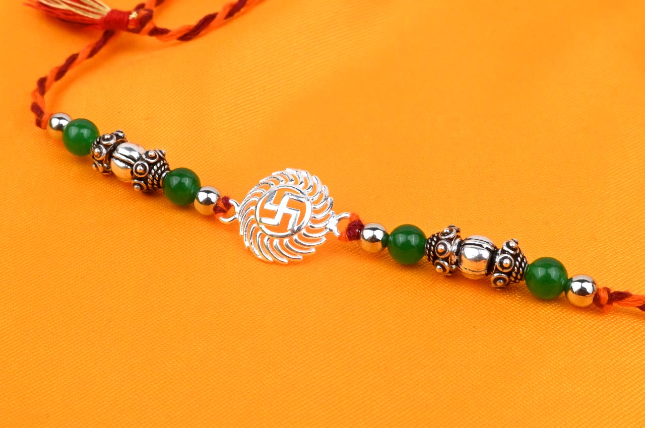 Swastik Design Rakhi in Pure Silver  in thread - II