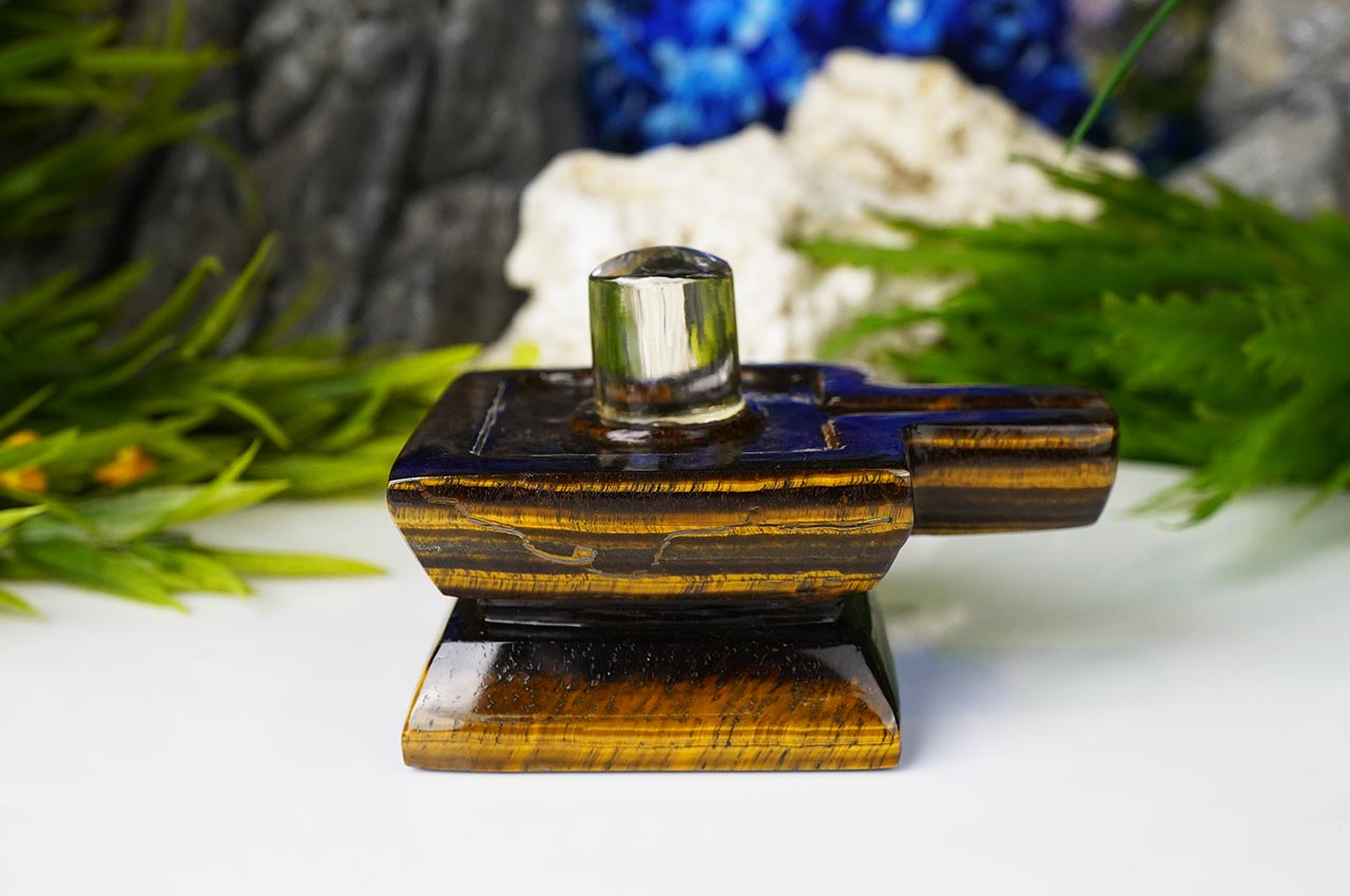 Sphatik Lingam with Tiger Eye Yoni Base