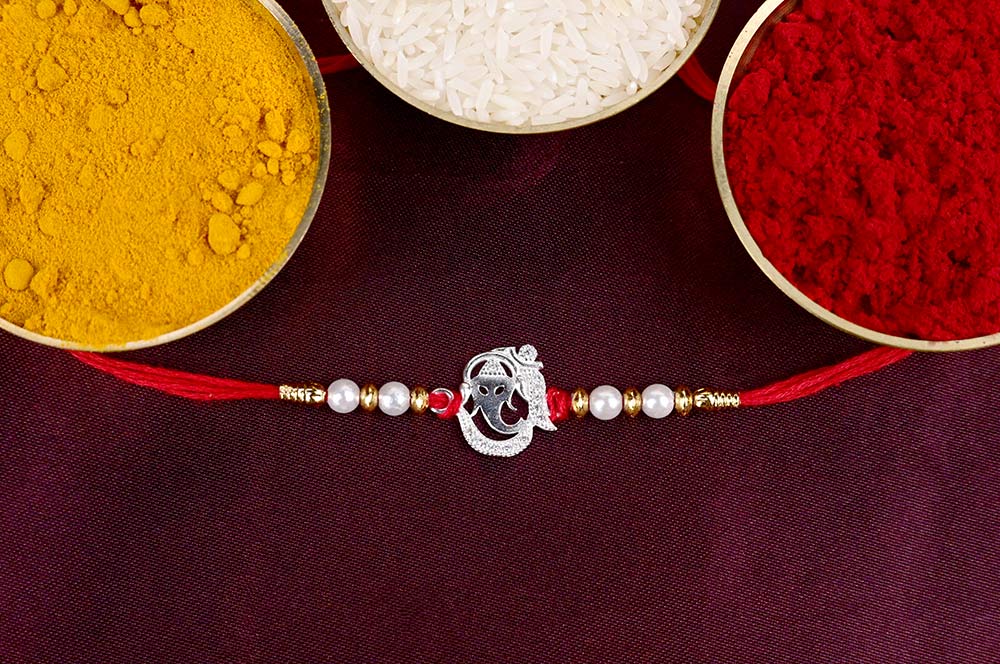 Ganesha OM with Pearls Designer Rakhi in 925 Silver