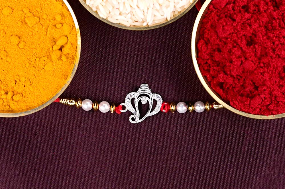 Designer Ganesh 925 Silver Pearls Rakhi