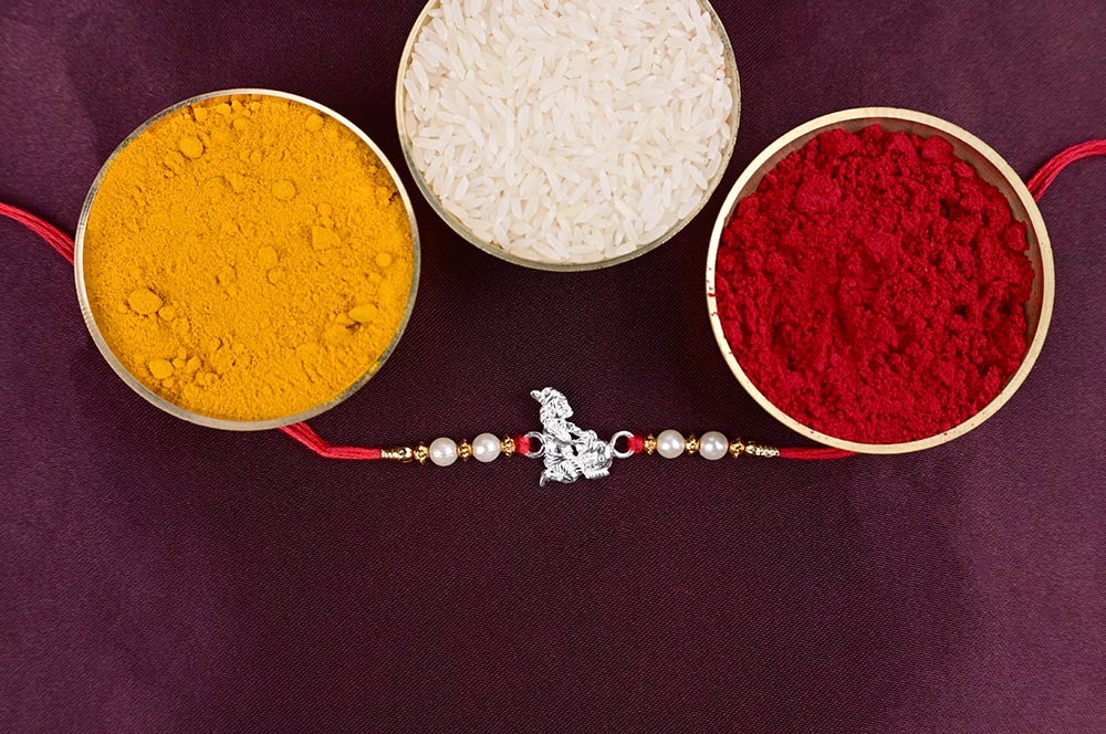 Makhanchor Krishna Rakhi with Pearls in 925 Silver