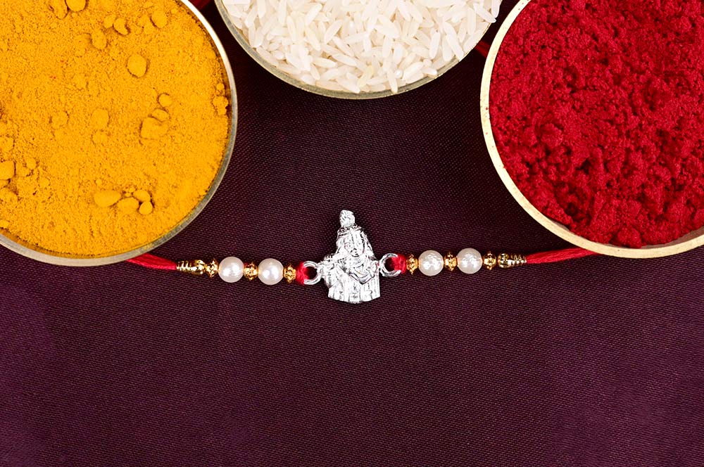 Krishna Designer Rakhi with Pearls in 925 Silver