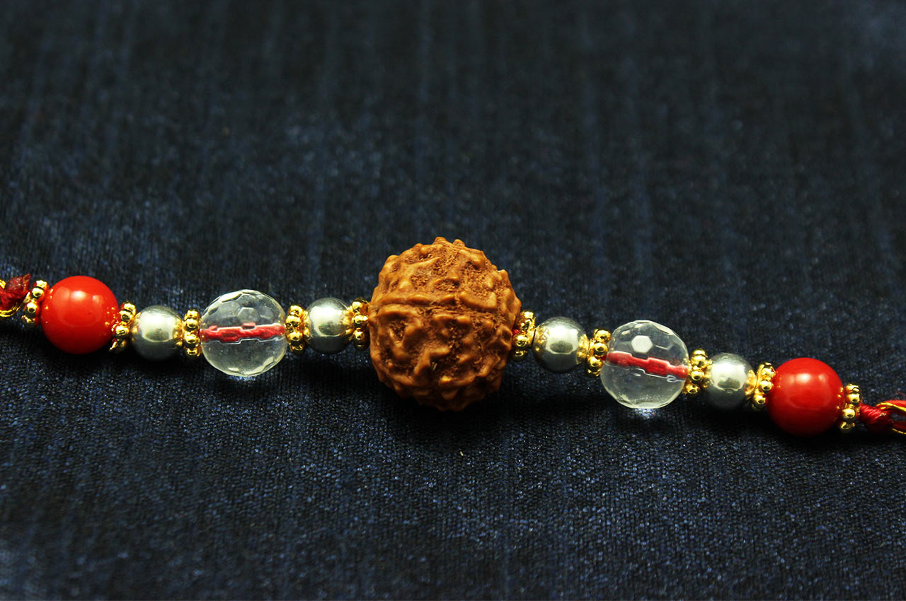 6 Mukhi Rakhi Sphatik and Coral Beads with Silver and Panchdhatu accessories