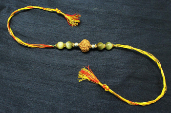 8 Mukhi Rakhi and Cats Eye beads with Panchdhatu Chakris - I