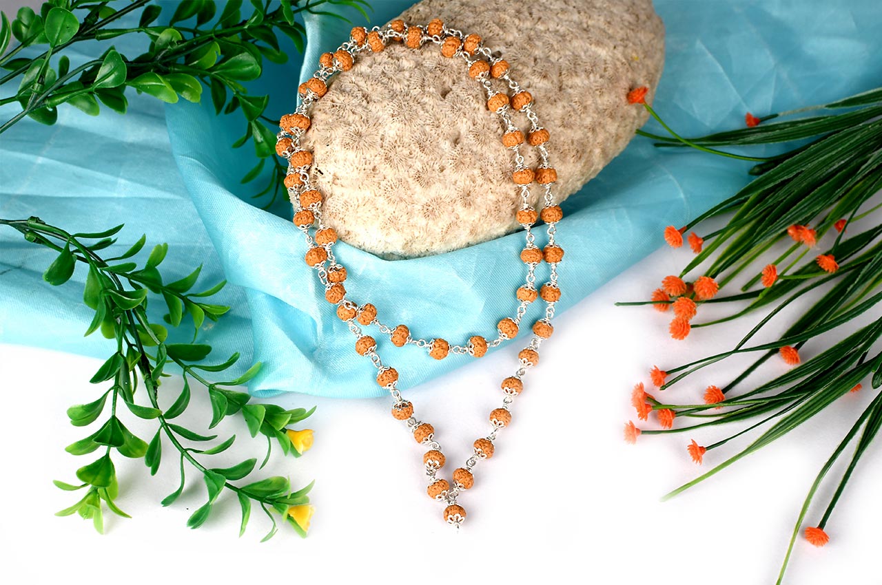 Rudraksha Chikna mala 8mm in designer silver flower caps