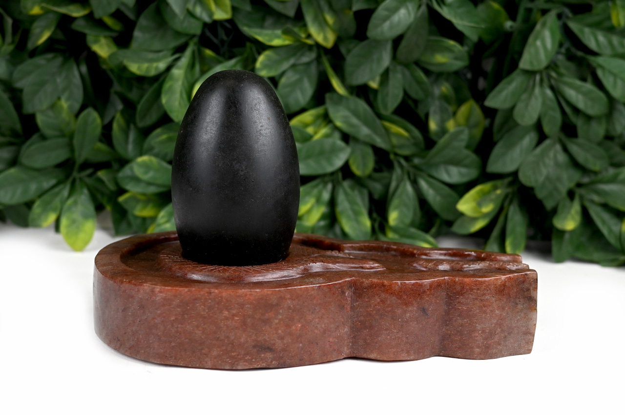 Black Narmada Lingam with Red Jade Yonibase