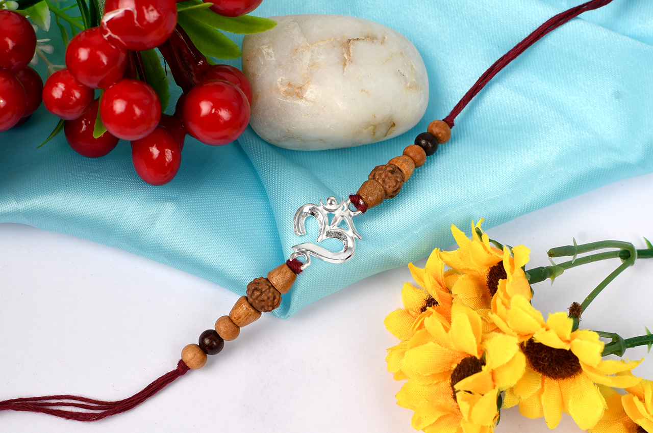 Om Rakhi  with Sandalwood beads
