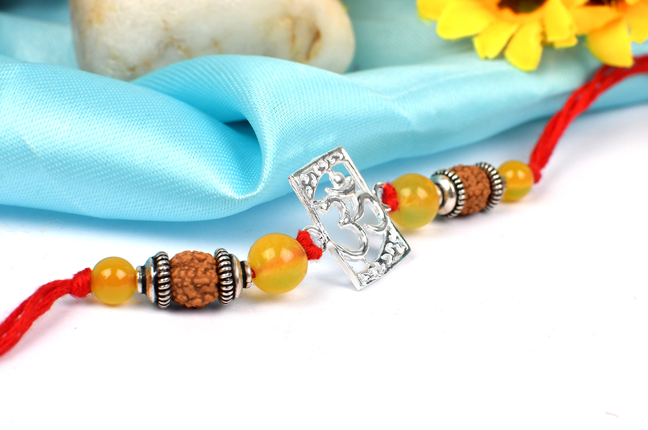 Om Rakhi  with  Yellow Agate beads