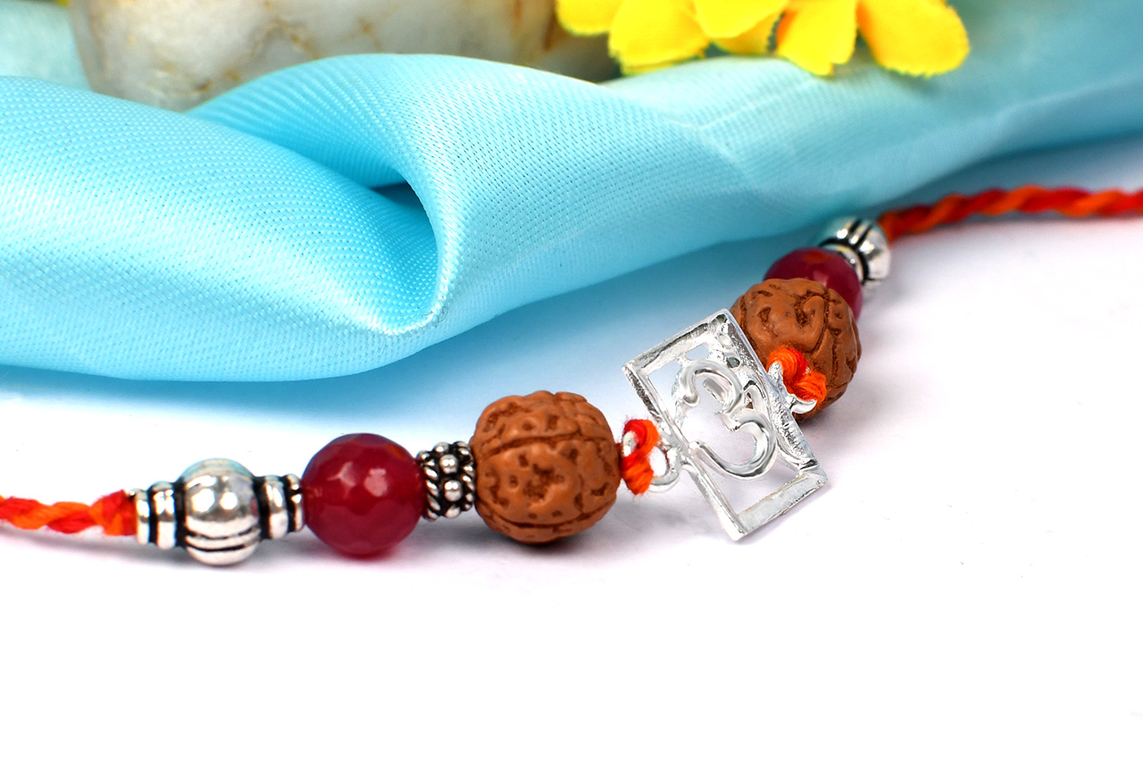 Om Rakhi with Pink Agate beads