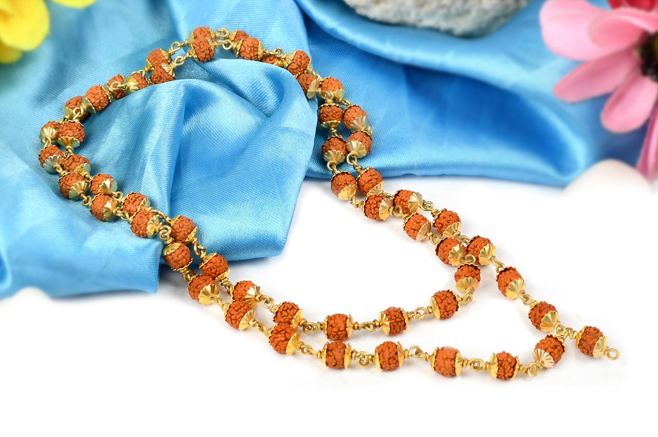 Rudraksha mala in gold polished caps-6 mm