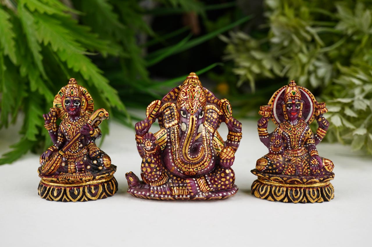 Ganesha Lakshmi and Saraswati Idols in pure Ruby