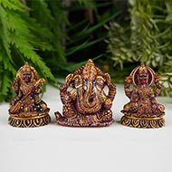 Ganesha Lakshmi and Saraswati Idols in pure Ruby