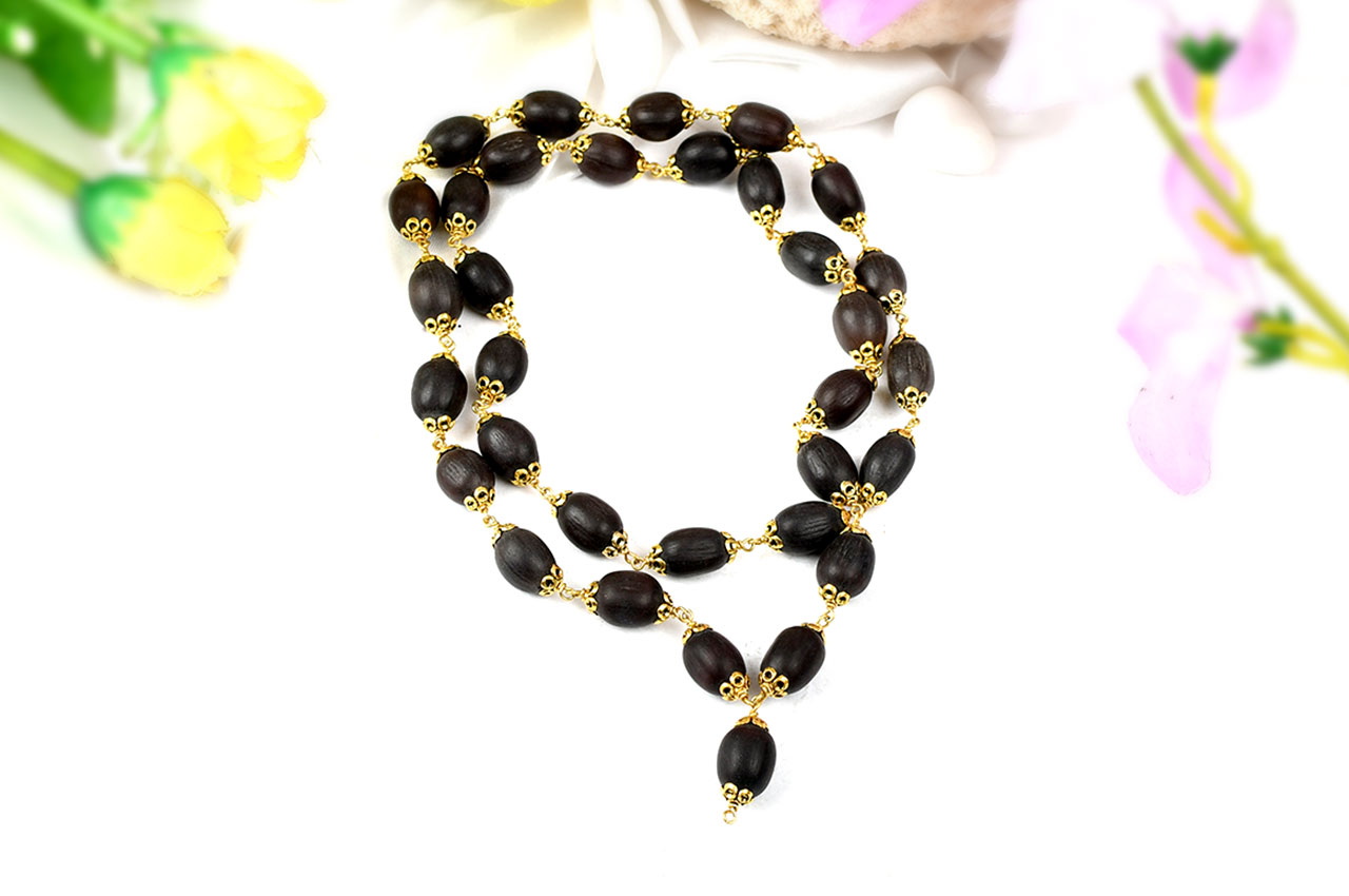 Lotus mala in designer gold polished caps