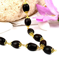 Lotus mala in designer gold polished caps