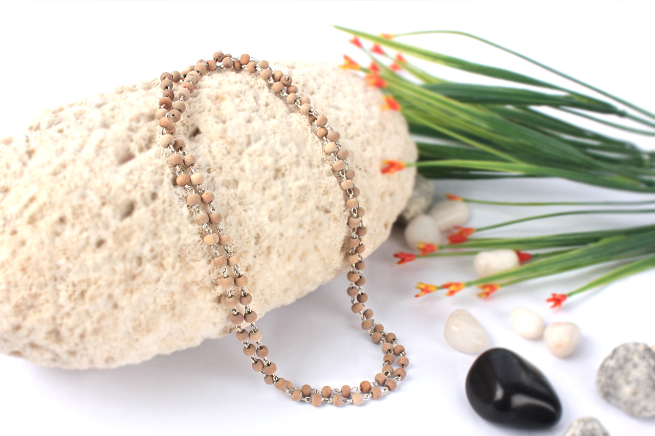 Sandalwood mala in silver