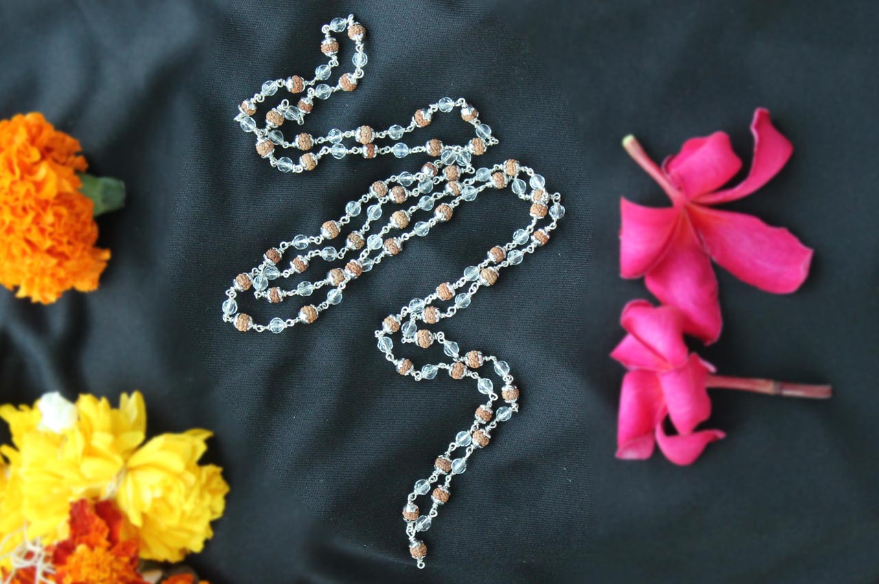 Rudraksha and Sphatik mala in silver flower caps