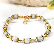 White Vaijayanti bracelet in designer Gold polish Caps