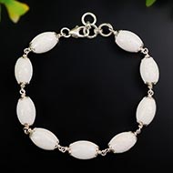 White Coral Drum Shape Silver Flower Caps Bracelet